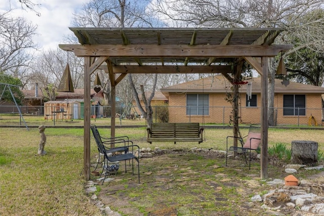 view of yard featuring a storage shed and a pergola