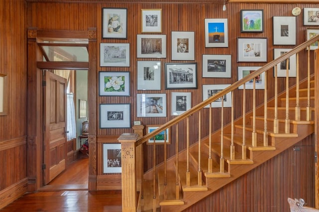 stairway featuring hardwood / wood-style floors