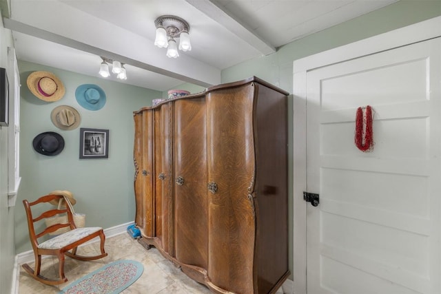 bathroom featuring tile patterned floors and a shower with shower curtain