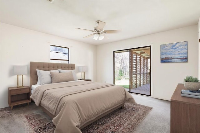 carpeted bedroom featuring access to outside and ceiling fan