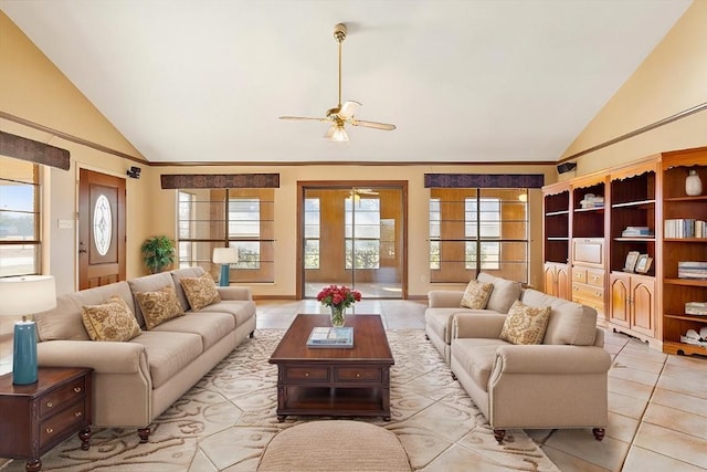 living room featuring lofted ceiling, light tile patterned floors, ornamental molding, and ceiling fan