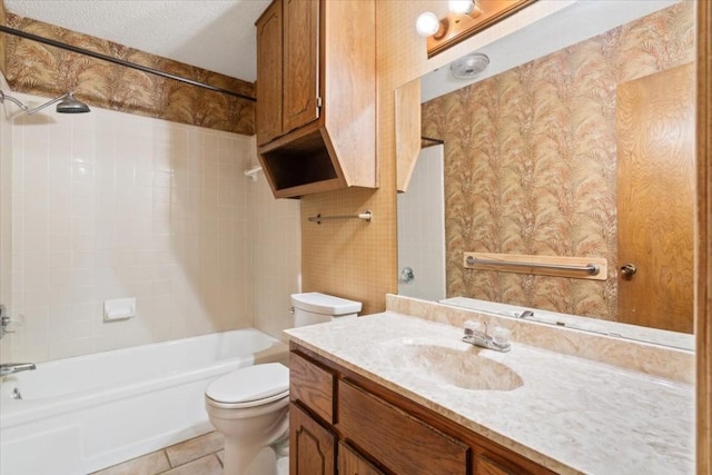 full bathroom with tile patterned flooring, vanity, a textured ceiling, bathtub / shower combination, and toilet