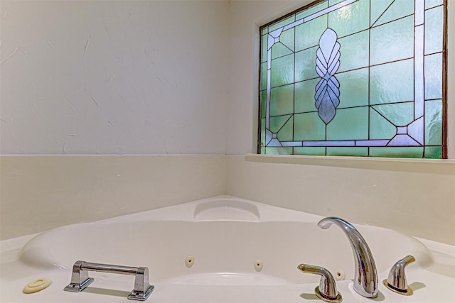 bathroom featuring a washtub