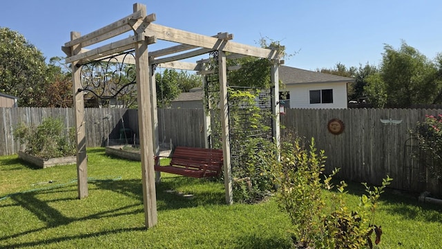 211 Valley Run Trl, Elgin, TX 78621 - view of yard with a fenced backyard and a vegetable garden
