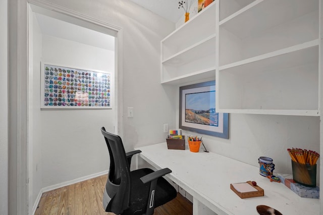 office area with light hardwood / wood-style flooring