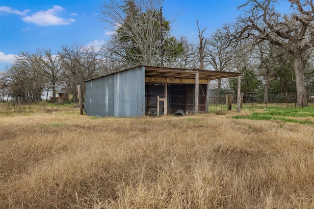 1252 County Road 106, Paige, TX 78659 - view of pole building featuring fence