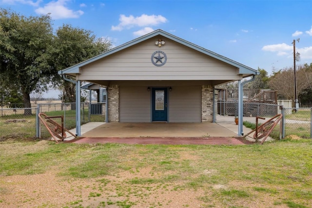 1252 County Road 106, Paige, TX 78659 - rear view of property featuring a gate, fence, a yard, and a patio
