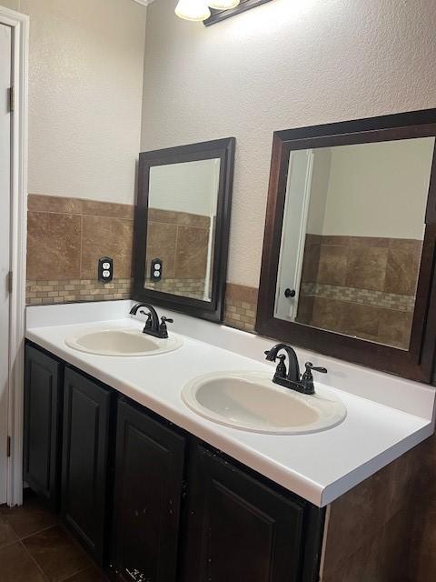 bathroom with vanity and tile patterned floors