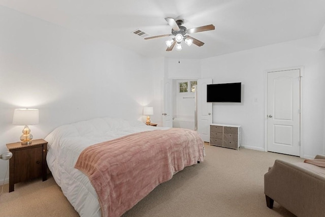 carpeted bedroom with ceiling fan