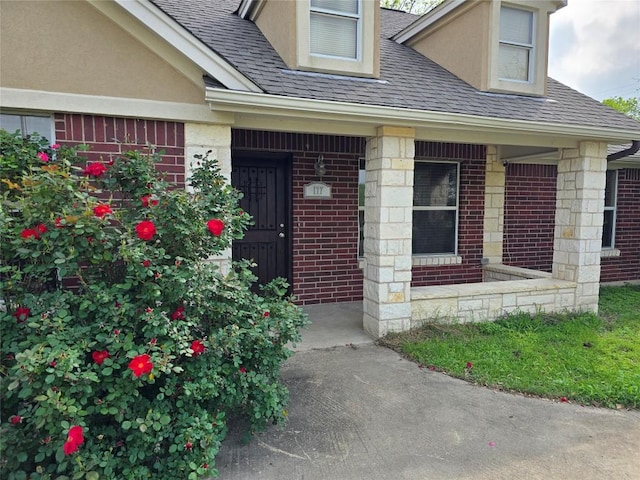 177 E Davilla St, Bartlett, TX 76511 - doorway to property with brick siding and a shingled roof