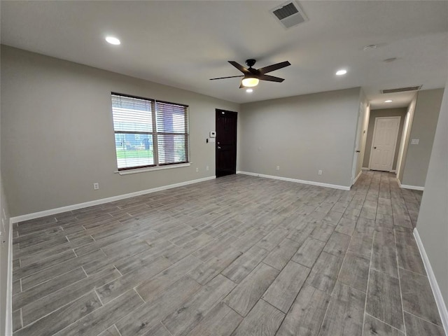 177 E Davilla St, Bartlett, TX 76511 - spare room featuring ceiling fan, baseboards, wood finished floors, and visible vents