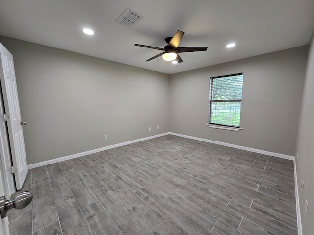 177 E Davilla St, Bartlett, TX 76511 - unfurnished room with wood finished floors, visible vents, baseboards, and ceiling fan