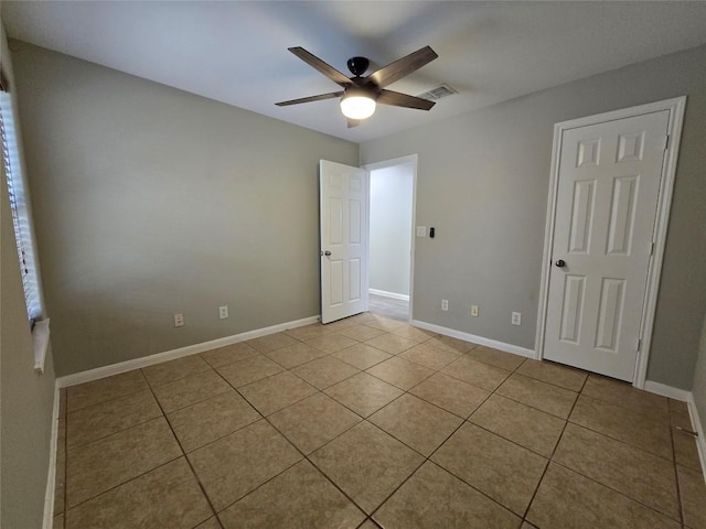 177 E Davilla St, Bartlett, TX 76511 - unfurnished bedroom with tile patterned floors, baseboards, and visible vents