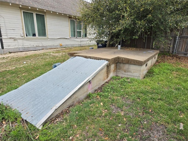 177 E Davilla St, Bartlett, TX 76511 - view of storm shelter with a yard and fence