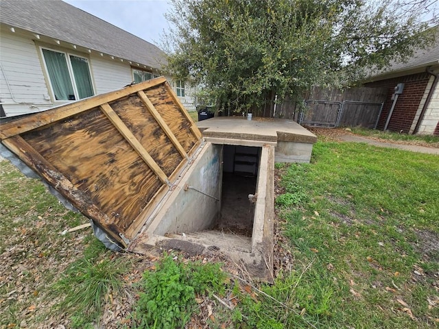 177 E Davilla St, Bartlett, TX 76511 - entry to storm shelter featuring fence
