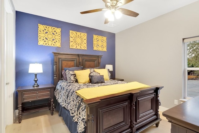 bedroom featuring ceiling fan and light wood-type flooring