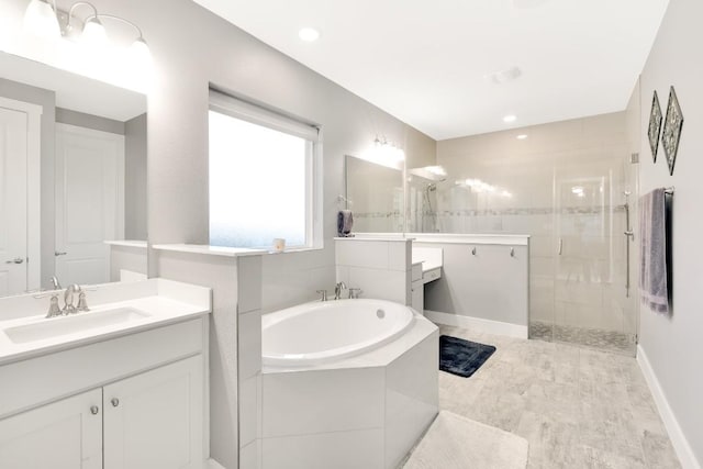 197 Bristlecone Dr, Driftwood, TX 78619 - full bath featuring a walk in shower, a bath, and vanity