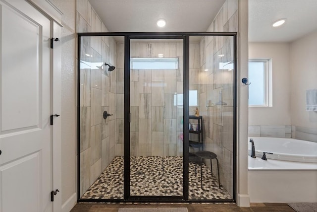 bathroom with independent shower and bath