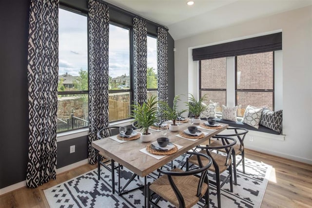 2516 Carretera Dr, Leander, TX 78641 - dining area featuring baseboards, recessed lighting, and wood finished floors