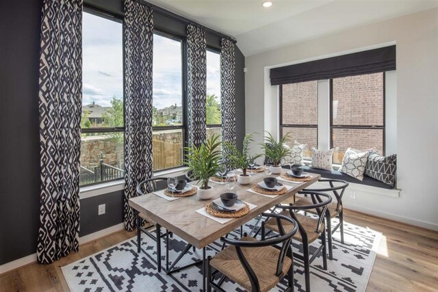 2516 Carretera Dr, Leander, TX 78641 - dining room with wood finished floors and recessed lighting