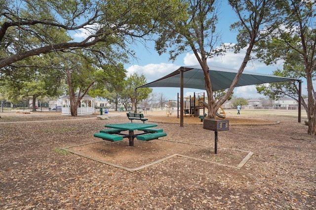 view of home's community featuring a playground