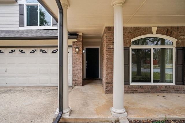 view of exterior entry featuring a garage