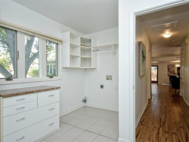 laundry area with hookup for a washing machine and electric dryer hookup