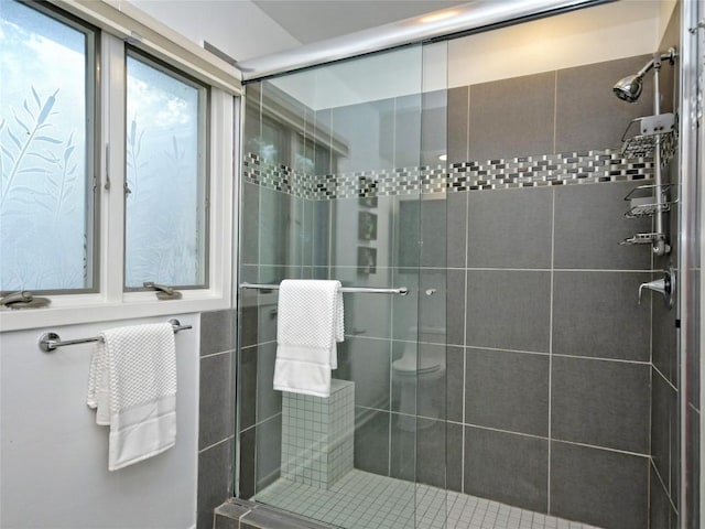 bathroom with an enclosed shower