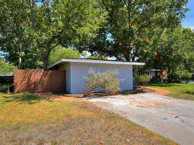 view of home's exterior featuring a lawn