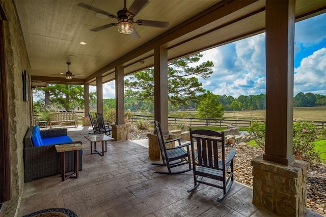 view of patio / terrace with a rural view and ceiling fan