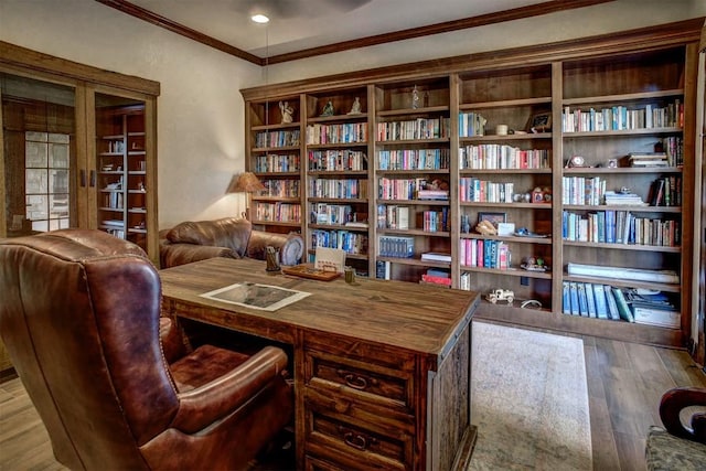 office space featuring wood-type flooring and ornamental molding