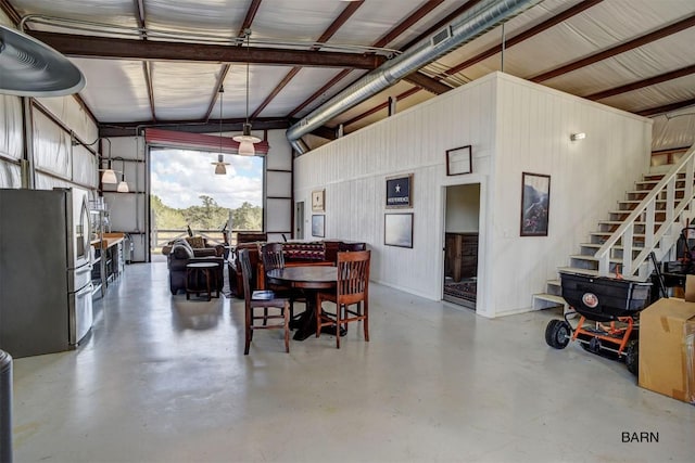 garage featuring stainless steel fridge