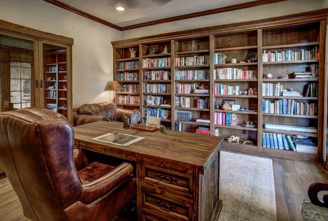 0000 Gotier Trace Rd, Smithville, TX 78957 - office featuring crown molding, wood finished floors, and bookshelves