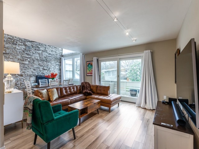 living room with light hardwood / wood-style floors