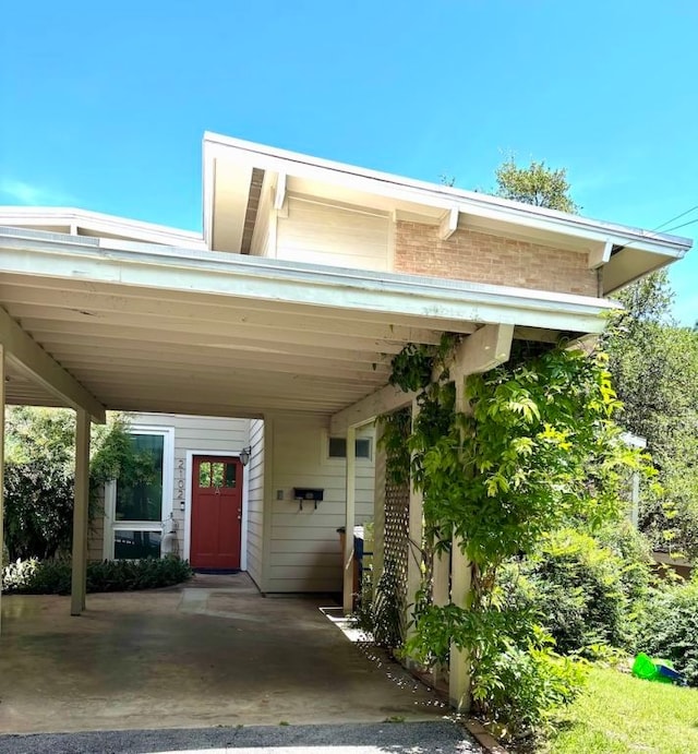 2102 W 11th St Unit A, Austin, TX 78703 - view of car parking with an attached carport