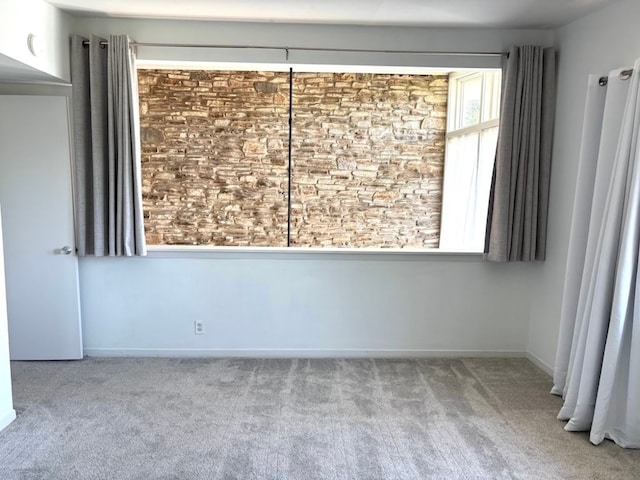 2102 W 11th St Unit A, Austin, TX 78703 - empty room featuring carpet floors and baseboards