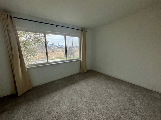 2102 W 11th St Unit A, Austin, TX 78703 - carpeted spare room with baseboards