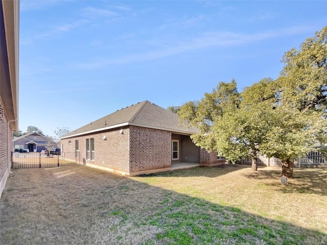 116 San View Dr, Georgetown, TX 78628 - rear view of house with brick siding