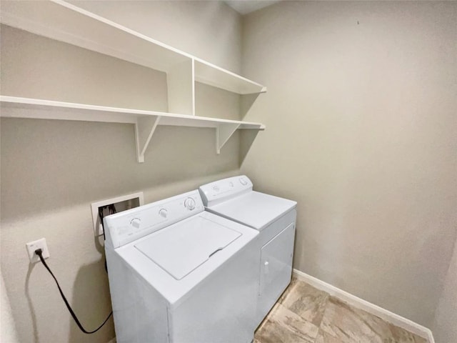 116 San View Dr, Georgetown, TX 78628 - laundry room featuring independent washer and dryer and baseboards