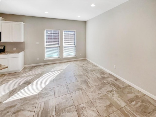 116 San View Dr, Georgetown, TX 78628 - unfurnished dining area featuring baseboards and recessed lighting