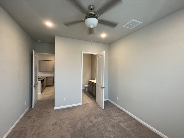 1015 Vista View Dr Unit 2901, Georgetown, TX 78626 - unfurnished bedroom featuring ensuite bath and light carpet