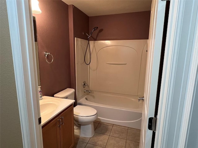 full bathroom featuring vanity, bathtub / shower combination, tile patterned floors, and toilet