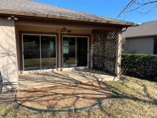 back of house featuring ceiling fan and a patio area