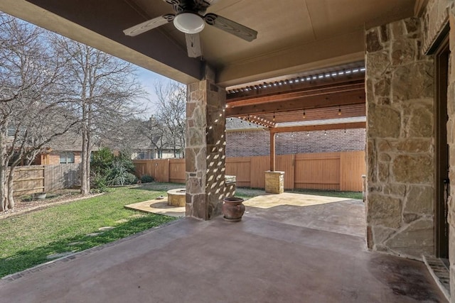 view of patio / terrace featuring ceiling fan