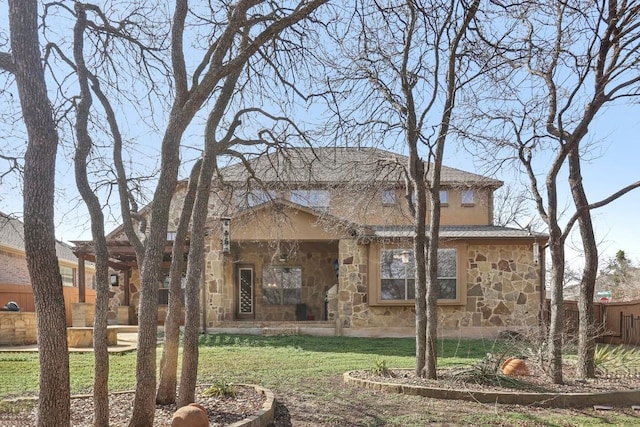 view of front facade featuring a front yard