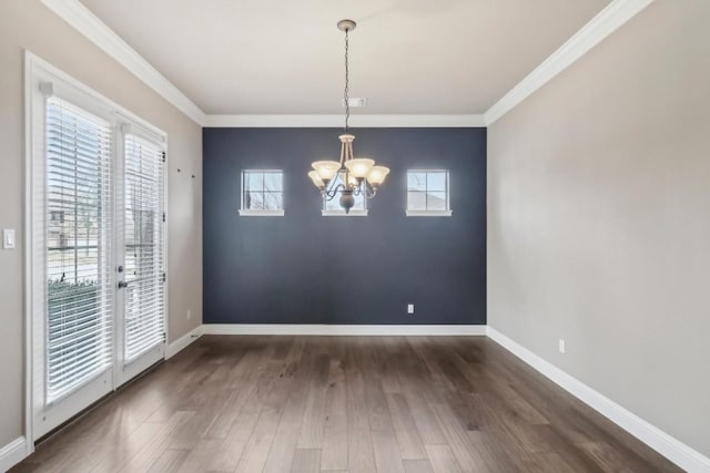 unfurnished dining area featuring ornamental molding, dark hardwood / wood-style flooring, and a notable chandelier