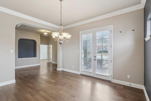 unfurnished dining area with crown molding and dark wood-type flooring