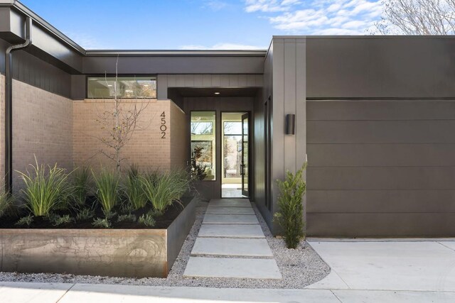 4502 Hyridge Dr, Austin, TX 78759 - entrance to property featuring an attached garage