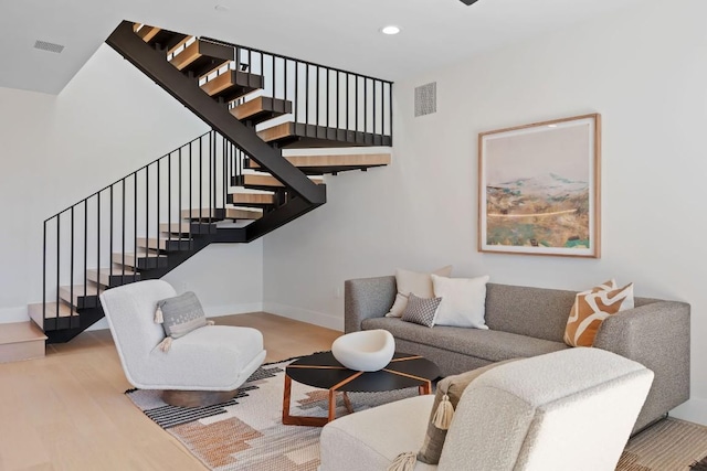 4502 Hyridge Dr, Austin, TX 78759 - living room with stairs, wood finished floors, and recessed lighting
