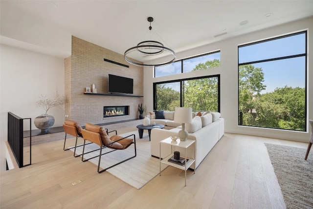 4502 Hyridge Dr, Austin, TX 78759 - living room with wood finished floors and a fireplace